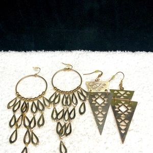 Two pairs of vintage long gold tone earrings